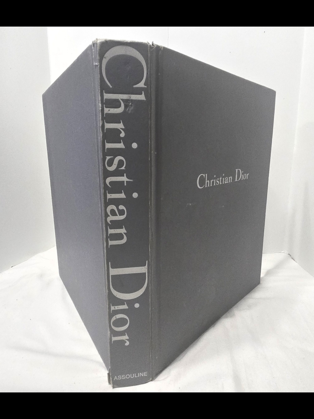 Dior Collectible Book - Textes De Farid CHENOUNE Gray Cover with White Text